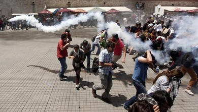 Riot police use tear gas to disperse the crowd during an anti-government protest at Taksim Square in central Istanbul June 1, 2013 (Reuters)