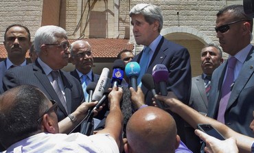 Kerry, with Abbas, makes a short statement for reporters during recent visit.