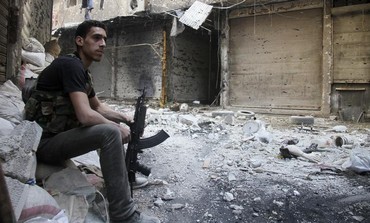 A Free Syrian Army fighter in Yarmouk refugee camp