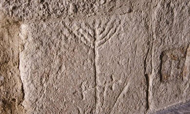 NAÏF HANUKKIA, scratched out at the entrance to the Church of San Pedro and San Idelfonso in Zamora.
