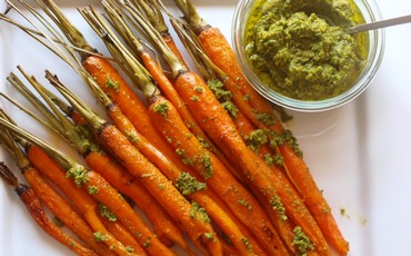 Roasted carrots with carrot top hazelnut pesto  (Gayle Squires)
