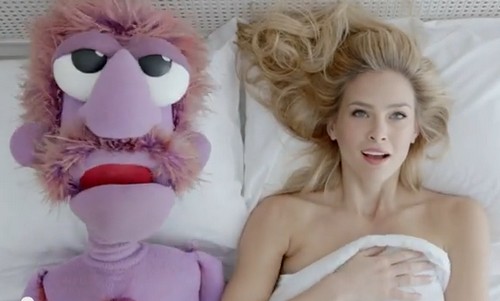 Bar Refaeli in bed with a muppet for the Hoodies commercial Photo: YOUTUBE SCREENSHOT