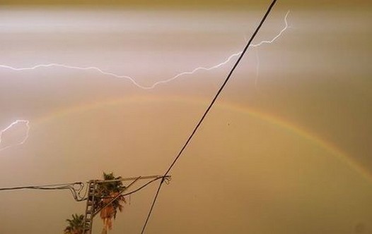 Rainbow in Hadera during rainstorm by Moran Kamil Galberg