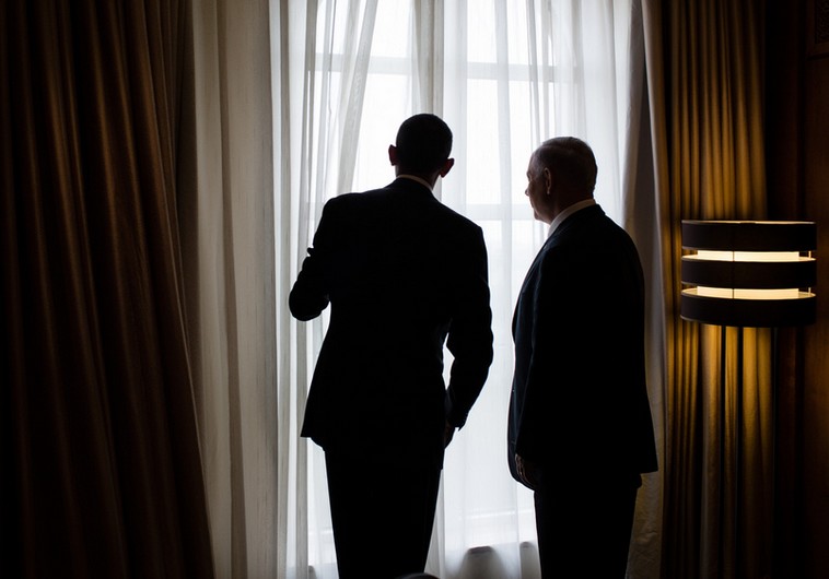US President Barack Obama and Prime Minister Benjamin Netanyahu look out a window at the King David Hotel in Jerusalem, March 22, 2013 (WHITE HOUSE/PETE SOUZA)
