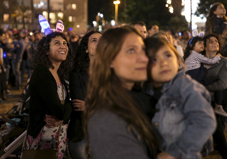 People watch fireworks in Tel Aviv 