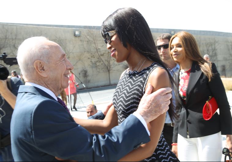 Supermodel Naomi Campgell with former president Shimon Peres at Int'l Women's Day event in Jaffa‏ (RAFI DELOYA)