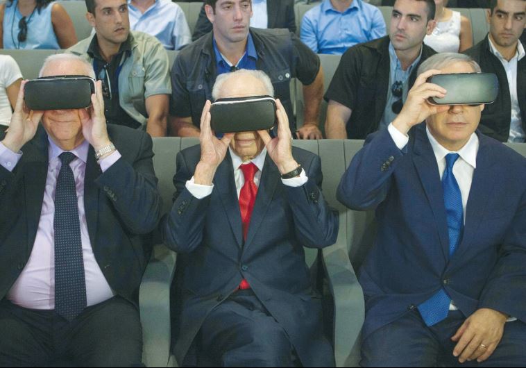 PRESIDENT REUVEN RIVLIN, former president Shimon Peres, and Prime Minister Benjamin Netanyahu don virtual reality goggles at the Peres Center for Peace and Innovation in Jaffa. REUTERS 