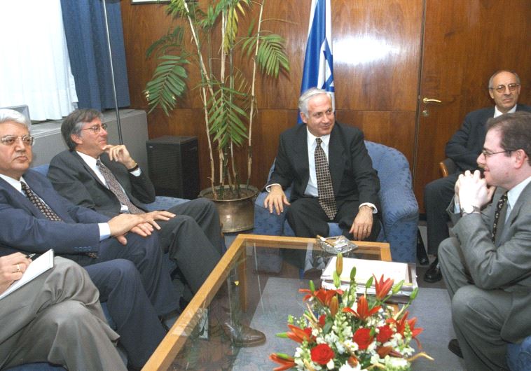 In October 1997, Netanyahu is seen meeting with US Envoy Dennis Ross, foreign minister David Levy (left), government secretary Danny Naveh (right) and Molcho. (Amos Ben Gershom/GPO)