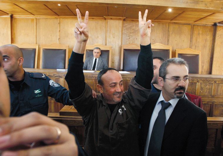 Marwan Barghouti, seen here at the Jerusalem Magistrates’ Court in 2012, is currently serving five life sentences for murder (Reuters)
