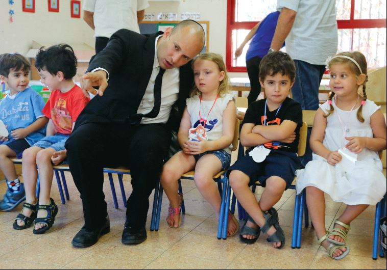 Education Minister Naftali Bennett meets with pupils at the start of the 2015/16 school year (photo credit: SASSON TIRAM)