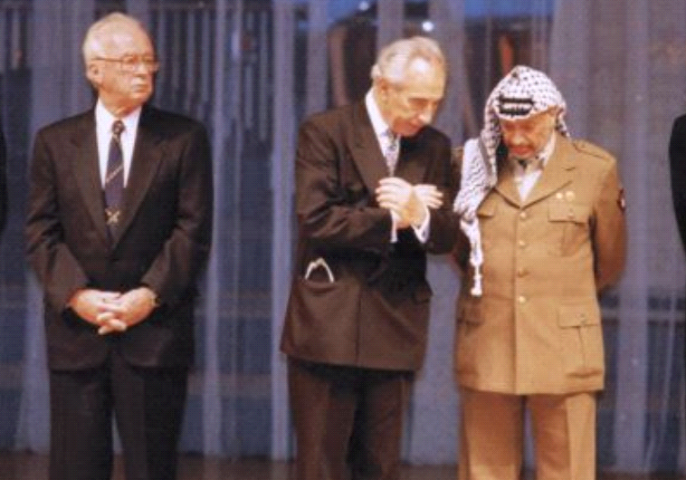 Yitzak Rabin, Shimon Peres and Yasser Arafat.(photo credit: REUVEN CASTRO)