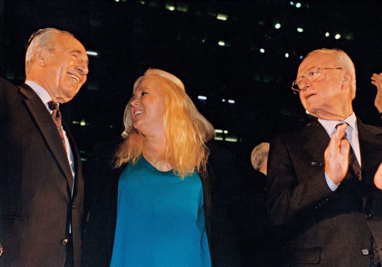 Shimon Peres sings alongside Miri Aloni and Yitzhak Rabin at a peace rally in Tel Aviv on November 4, 1995. Rabin was assassinated shortly afterward (photo credit: NOAM WIND)