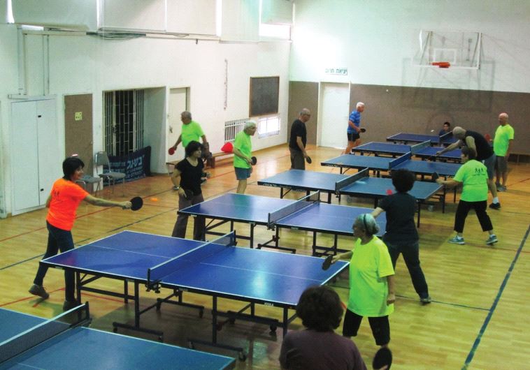 Staying fit: The day center houses many spaces for exercise and sport, like table tennis (photo credit: Courtesy)