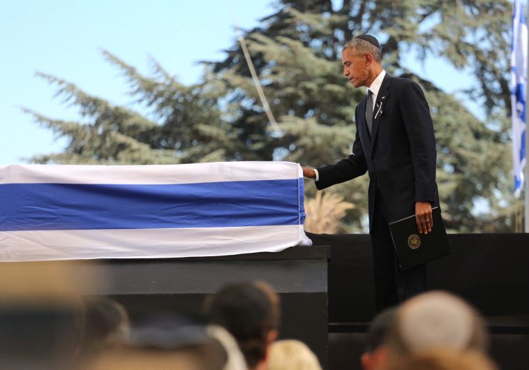US President Barack Obama paying respects to the late Shimon Peres. Credit: Emil Salman/Pool