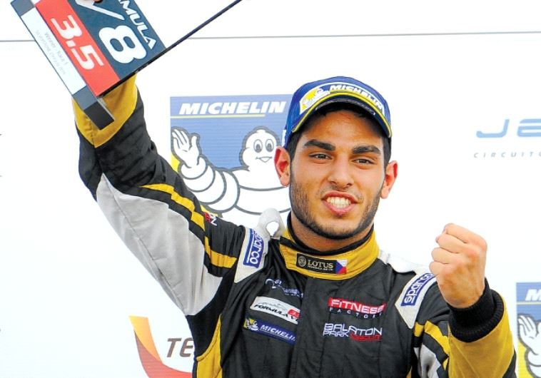 Nissany celebrates a victory at the Silverstone circuit in England, his first in the Formula V8 3.5 world championship (photo credit: Courtesy)