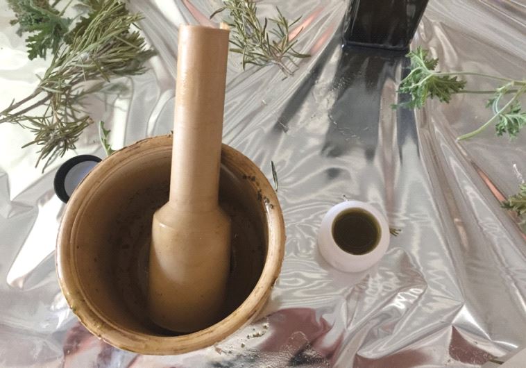   With a simple mortar and pestle, one can make all sorts of cosmetics and treatments in a traditional manner (photo credit: SETH J. FRANTZMAN)