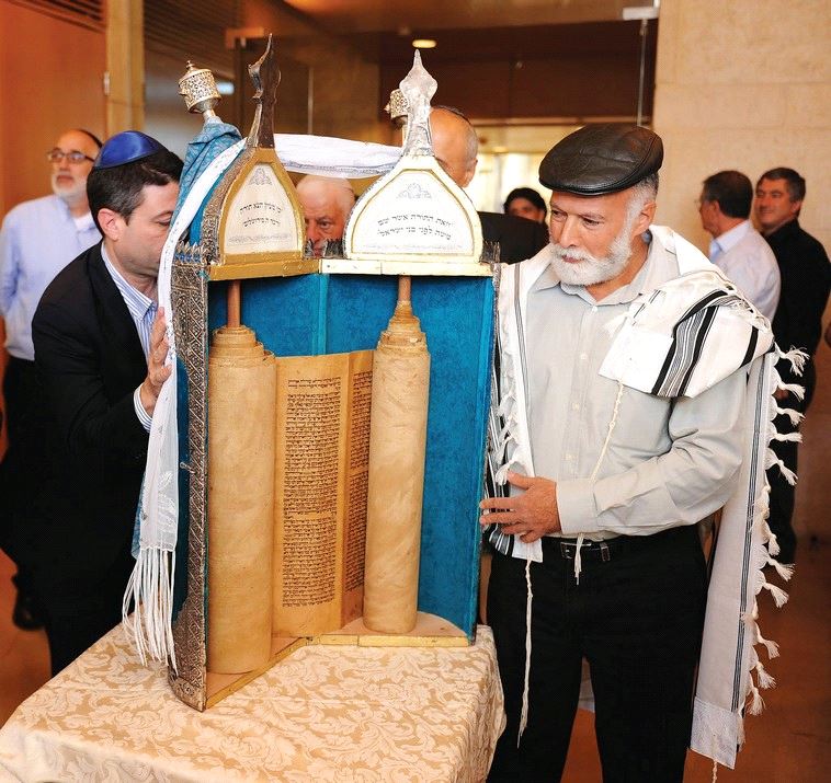 THE TORAH scroll from Baghdad during its dedication ceremony at the Foreign Ministry in 2015 (Elaram Mendel/Foreighn Ministry)