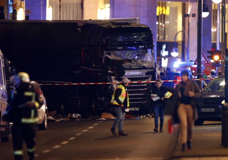 A truck plowed through a Christmas market in Berlin, killing multiple people and injuring more. (Reuters)