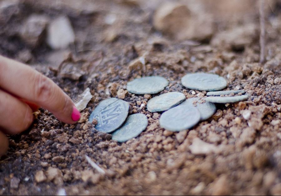 A small hoard of Byzantine coins discovered down a well in Israel