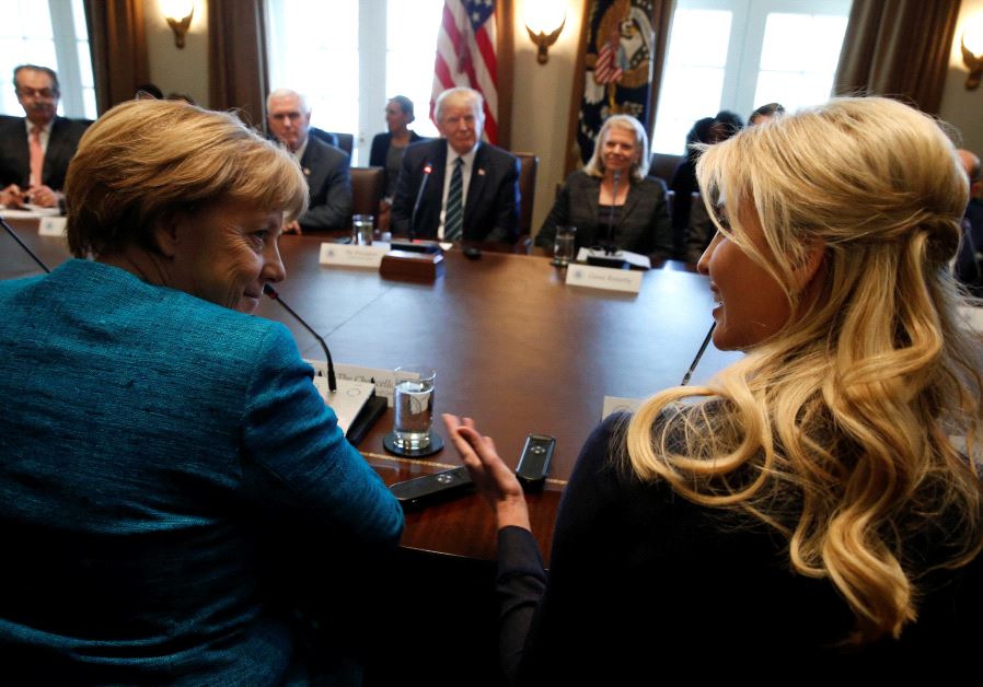 Germany's Chancellor Angela Merkel (L) and Ivanka Trump speak during a roundtable discussion between US President Donald Trump and German and US business leaders on vocational training at the White House in Washington, March 17, 2017