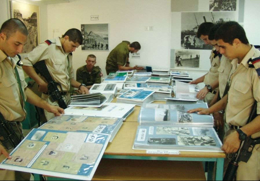 Soldiers examine documentation at the Palmah Museum in Ramat Aviv (PALMAH MUSEUM WEBSITE)
