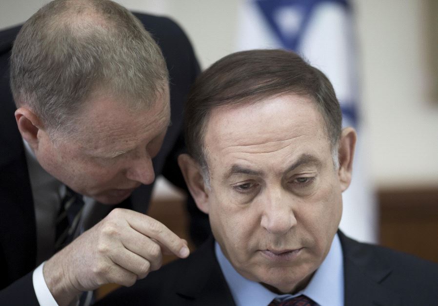 A darker hairdo for Israel's Prime Minister. (Abir Sultan/AFP)