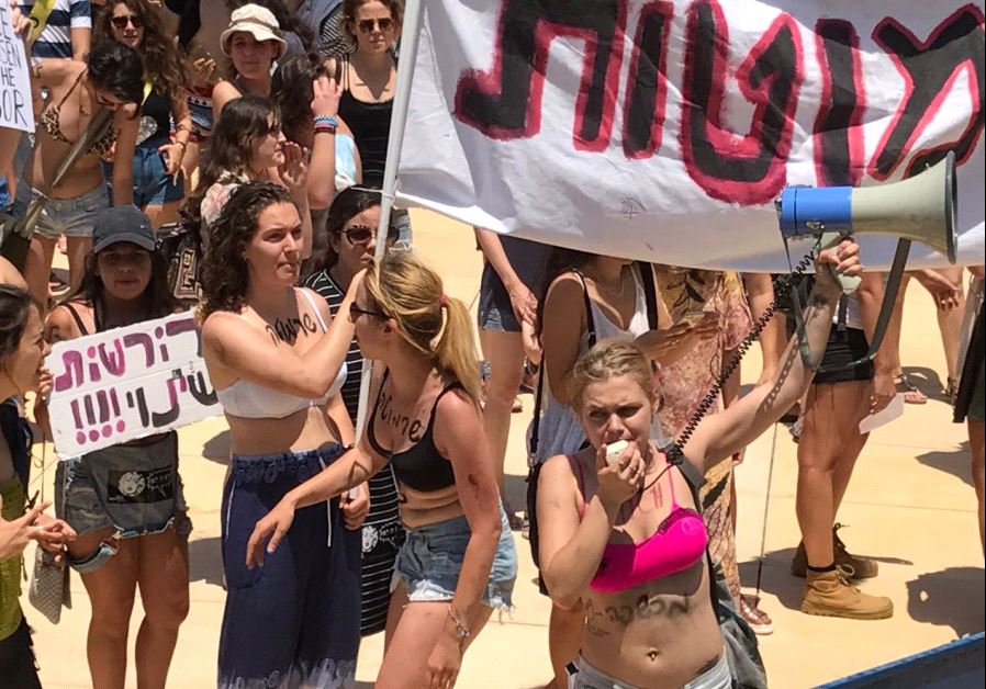 People take part in a "SlutWalk" protest, during which several hundred participants march through the centre of Tel Aviv, May 12, 2017. (Avshalom Sassoni/Maariv)