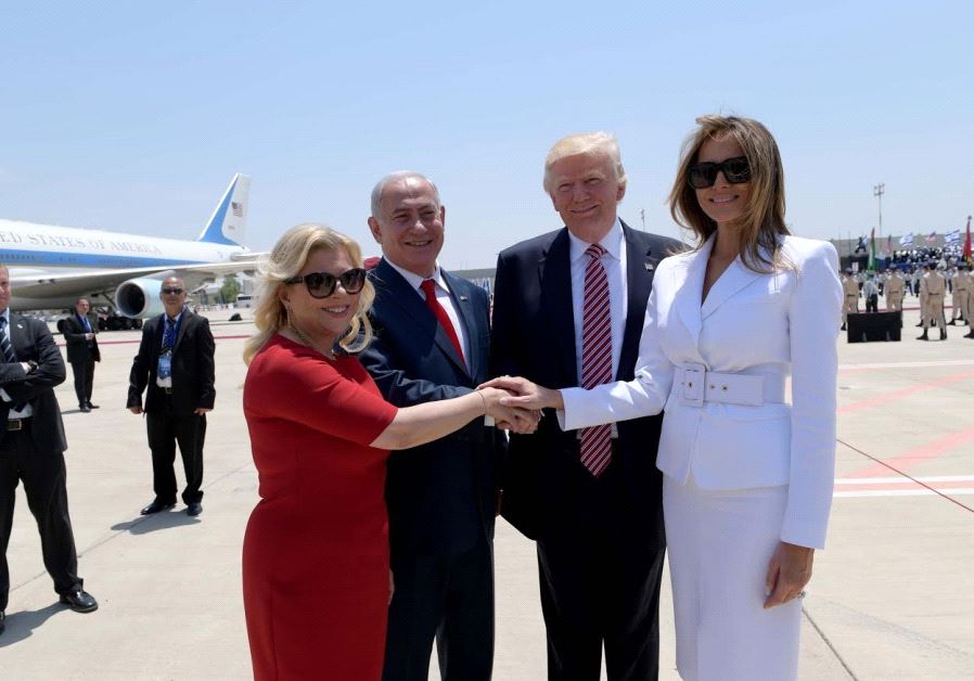 Prime Minister Benjamin Netanyahu and his wife, Sara, (L) greet US President Donald Trump and First Lady Melania Trump at Israels Ben-Gurion Airport, May 22, 2017 (AVI OHAYON - GPO)