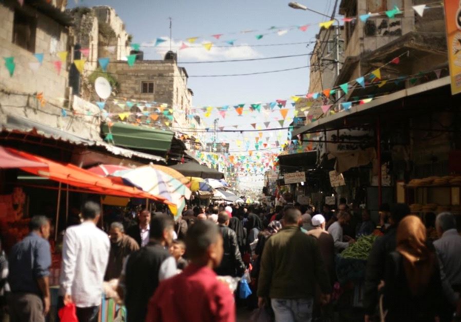 A busy Saturday in the market area of Nablus's Old City, March, 2016 (photo credit: ELIYAHU KAMISHER)