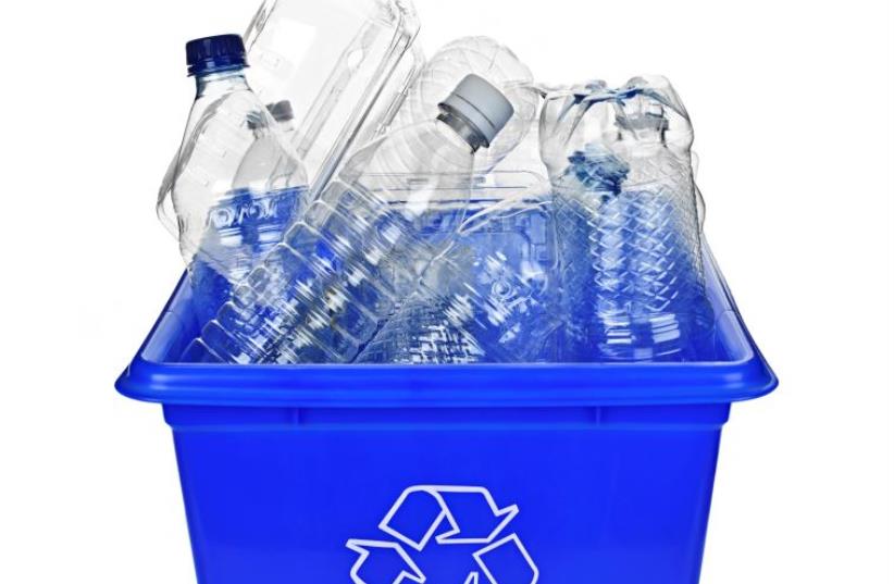 Recycling box filled with clear plastic containers (illustrative) (photo credit: INGIMAGE)