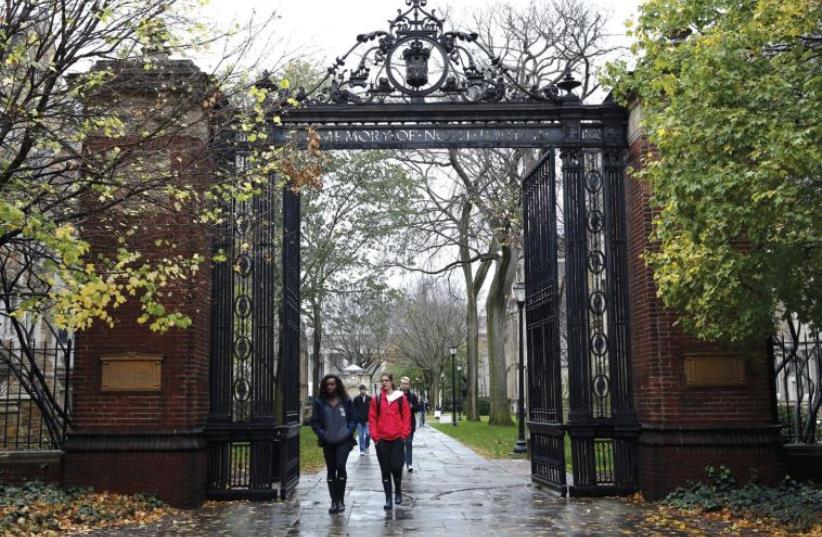 STUDENTS WALK on the campus of a university in Connecticut (photo credit: REUTERS)