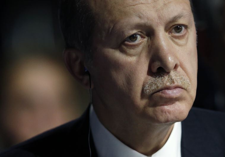 Turkish President Tayyip Erdogan attends the opening session of the World Climate Change Conference