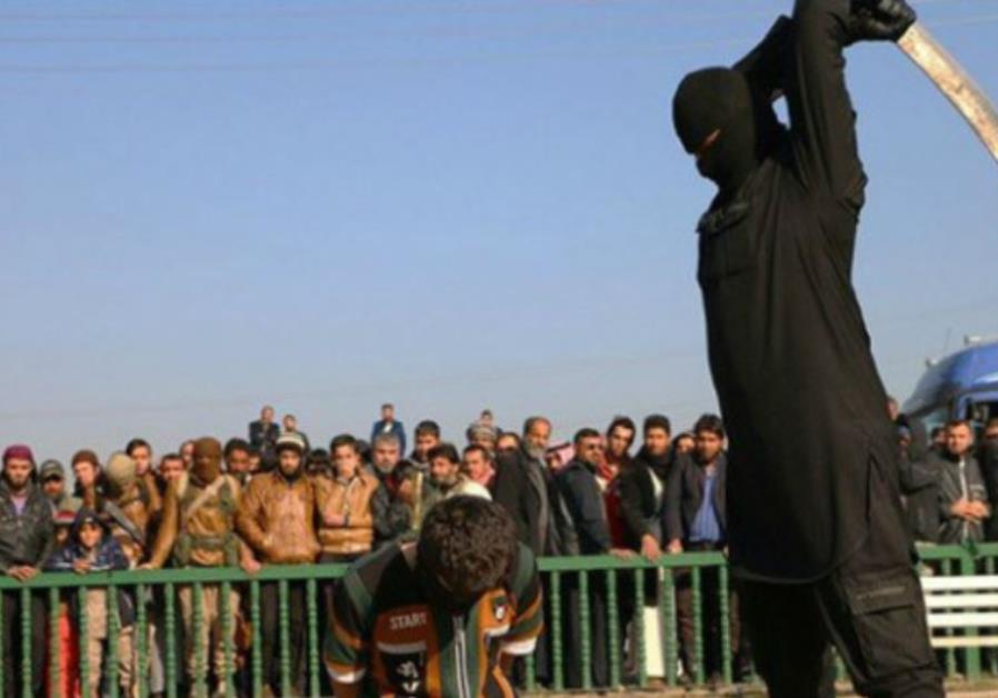ISIS fighter beheading boy, 16, in Syria