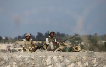 Egyptian soldiers keep guard in Sinai