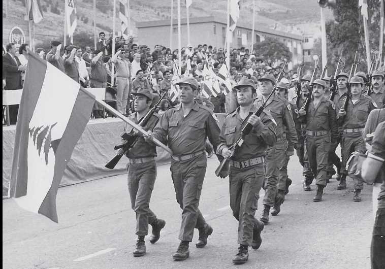 A unit from the South Lebanon Army marches in a Yom Ha&rsquo;atzmaut parade in Kiryat Shmona in 1982.
