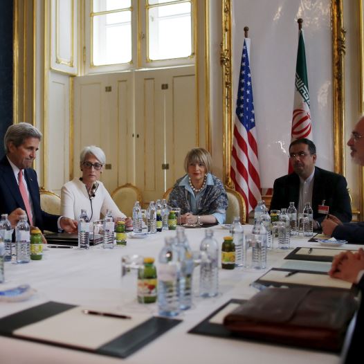 US Secretary of Energy Ernest Moniz, US Secretary of State John Kerry and U.S. Under Secretary for Political Affairs Wendy Sherman (L-3rd L) meet with Iranian Foreign Minister Mohammad Javad Zarif (2nd R) at a hotel in Vienna, Austria June 27, 2015. (credit: REUTERS)