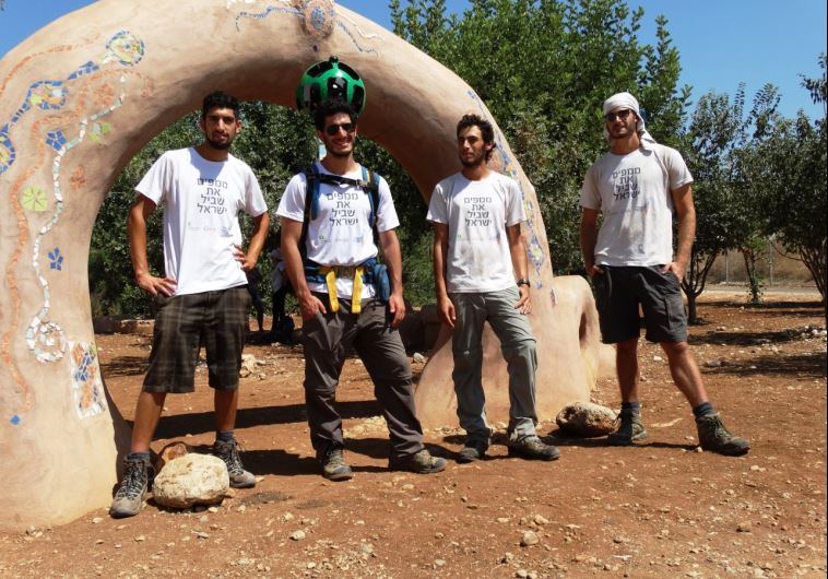 Members of the Society for the Protection of Nature in Israel traverse and photograph the Israel Trail