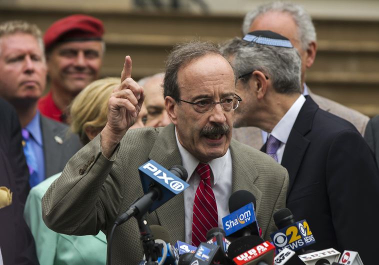 US Representative Eliot Engel (D-NY) speaks during a pro-Israel rally organized by local Jewish communities in front of City Hall in New York