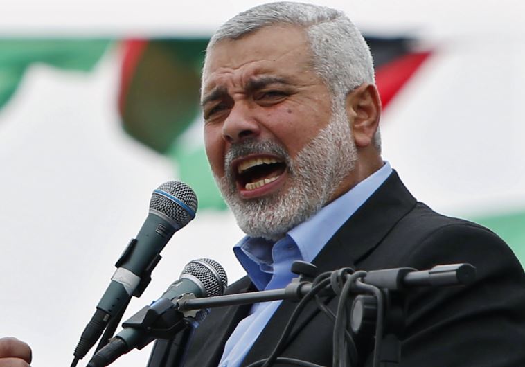Ismail Haniyeh talks to his supporters during a Hamas rally in Gaza City (credit: REUTERS)