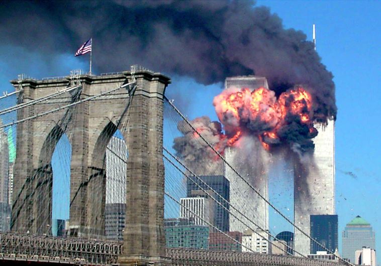 The second tower of the World Trade Center bursts into flames after being hit by a hijacked airplane in New York on September 11, 2001. (credit: REUTERS)