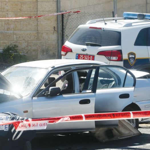 Illustrative photo of police at a crime scene (credit: MARC ISRAEL SELLEM/THE JERUSALEM POST)
