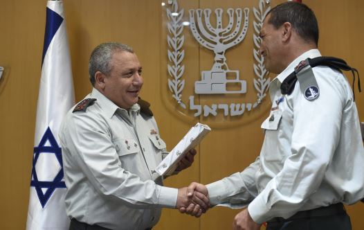 Newly appointed IDF Southern Command chief Maj.-Gen. Eyal Zamir (right) shakes hands with IDF Chief of Staff Lt.-Gen. Gadi Eisenkot. (credit: IDF SPOKESMAN’S UNIT)