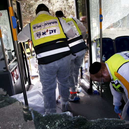 Members of Zaka Rescue and Recovery team at the scene of terror attack in Armon Hanatziv, Jerusalem