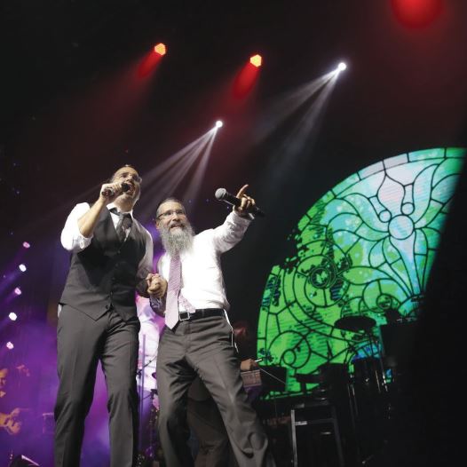 SINGERS AVRAHAM FRIED (right) and Yaakov Shwekey performing at a benefit concert for United Hatzalah in Jerusalem (credit: ITZIK ROSEK)
