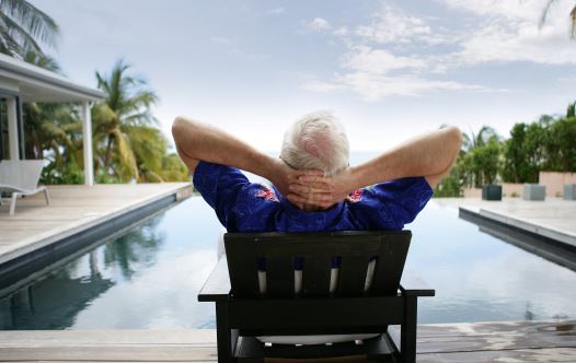 Illlustrative photo of a man relaxing on vacation (credit: INGIMAGE)