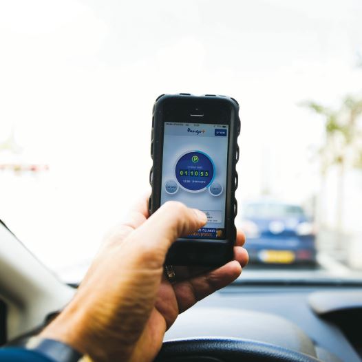 PANGO, an Israeli parking app, is seen on a smartphone in Jerusalem earlier this year. A band of young entrepreneurs, policy makers and investors are starting to change the Jerusalem ecosystem and bring it in line with Tel Aviv as a modern, hi-tech hub.