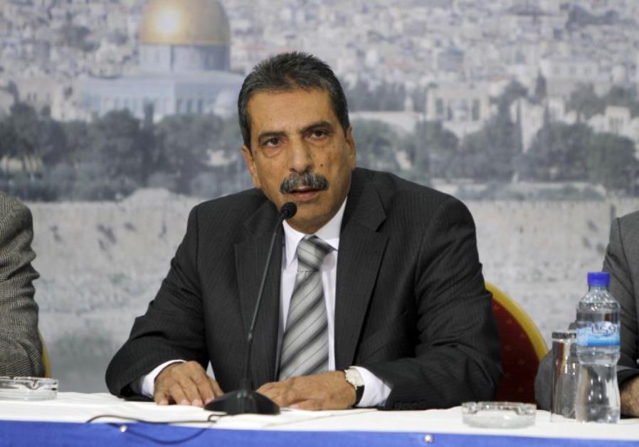 Tawfiq Tirawi speaks during a news conference in the West Bank city of Ramallah