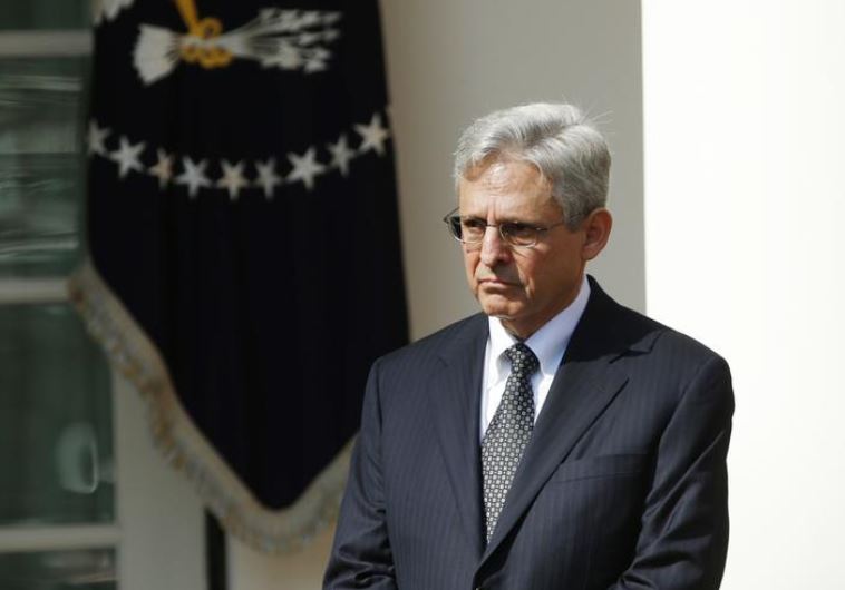 US President Barack Obama (not pictured) announces Judge Merrick Garland (R) of the United States Court of Appeals as his nominee for the US Supreme Court in the Rose Garden of the White House in Washington March 16, 2016. (credit: REUTERS)
