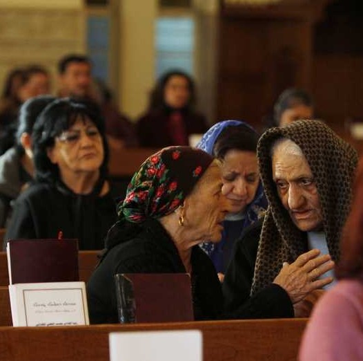 Iraqi Christians attend mass at Mar George Chaldean Church in Baghdad, March 1, 2015. Iraqi Christians say they have no intention of leaving the country despite the recent abduction of over 100 Assyrian Christians by the Islamic State (credit: REUTERS)