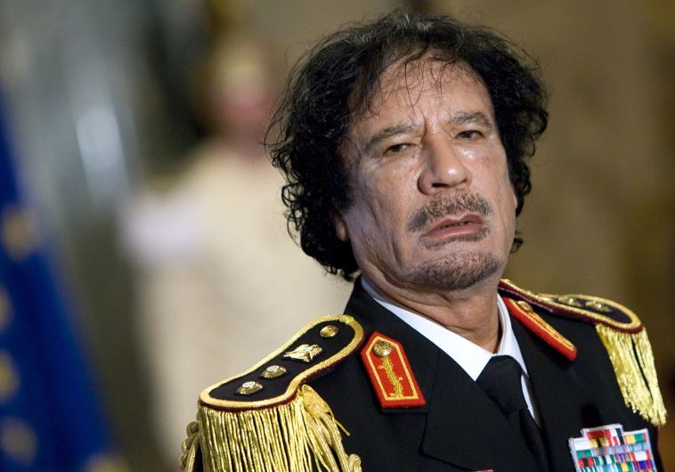 Former Libyan leader Muammar Gaddafi, file photo, June 10, 2009  (credit: REUTERS)
